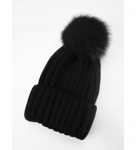 black winter hat with pom pom